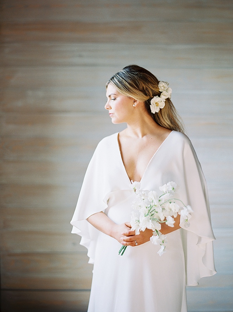 bride holding bouquet by Jaclyn Journey 