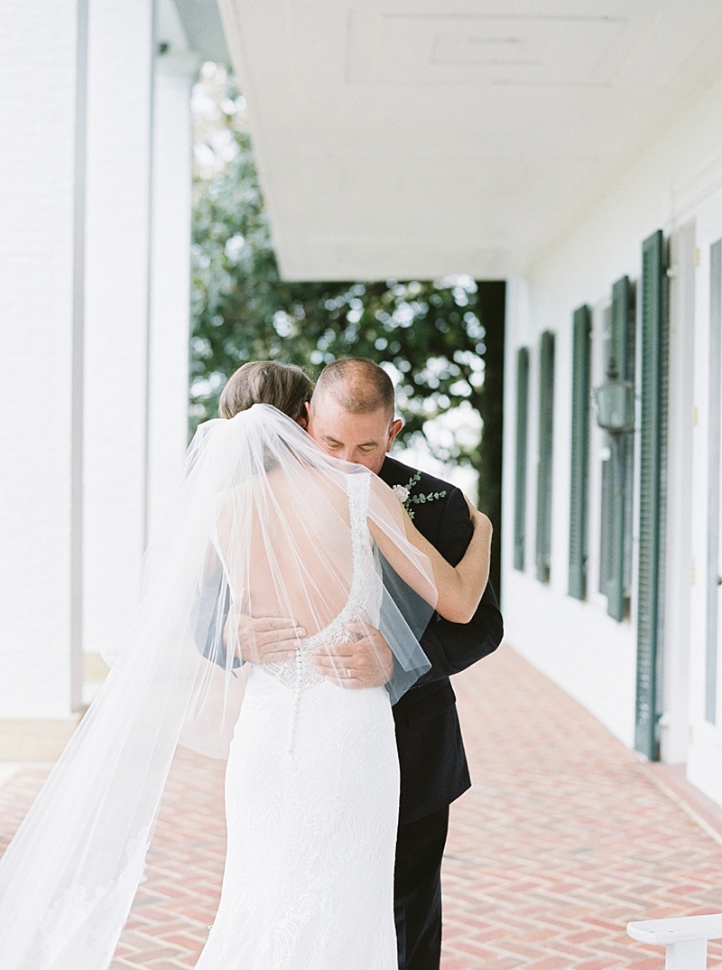 father hugging daughter